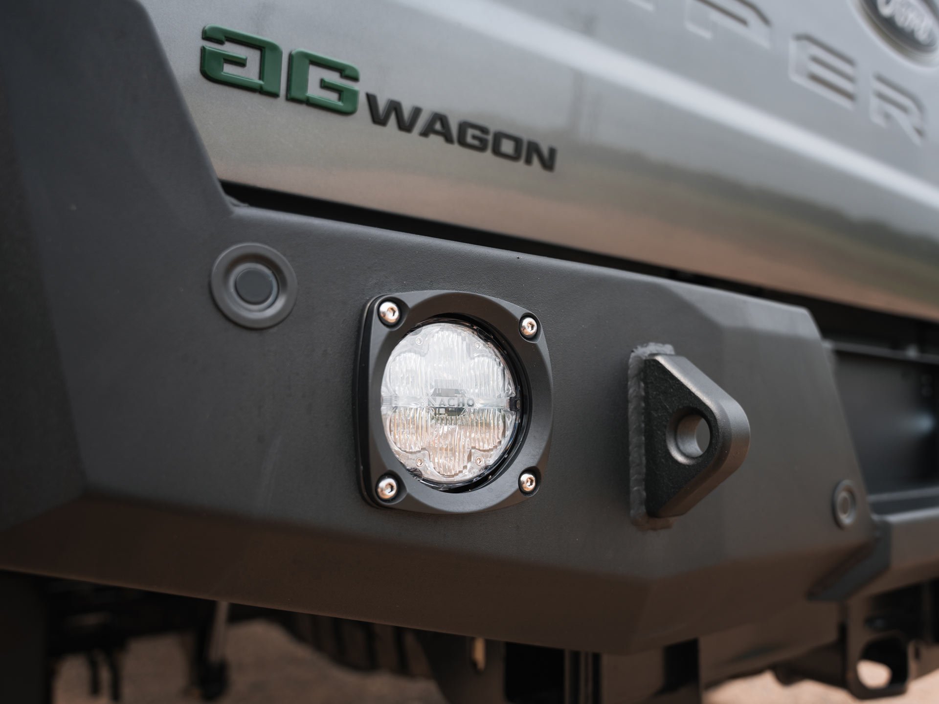 Rear facing, bumper mounted lights